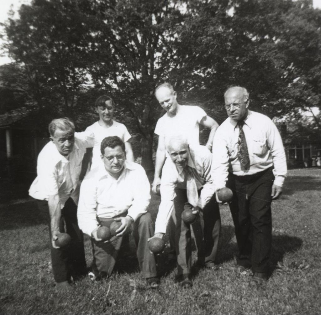 Miniature of Men posing with lawn bowling balls at Bowen Country Club