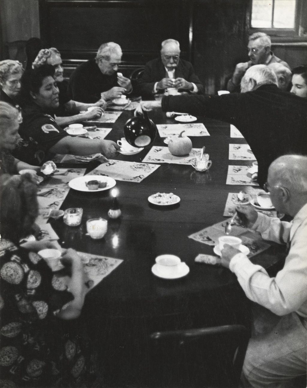 Miniature of Members of the Hull-House senior citizens club having coffee or tea and cupcakes in the Residents Dining Hall