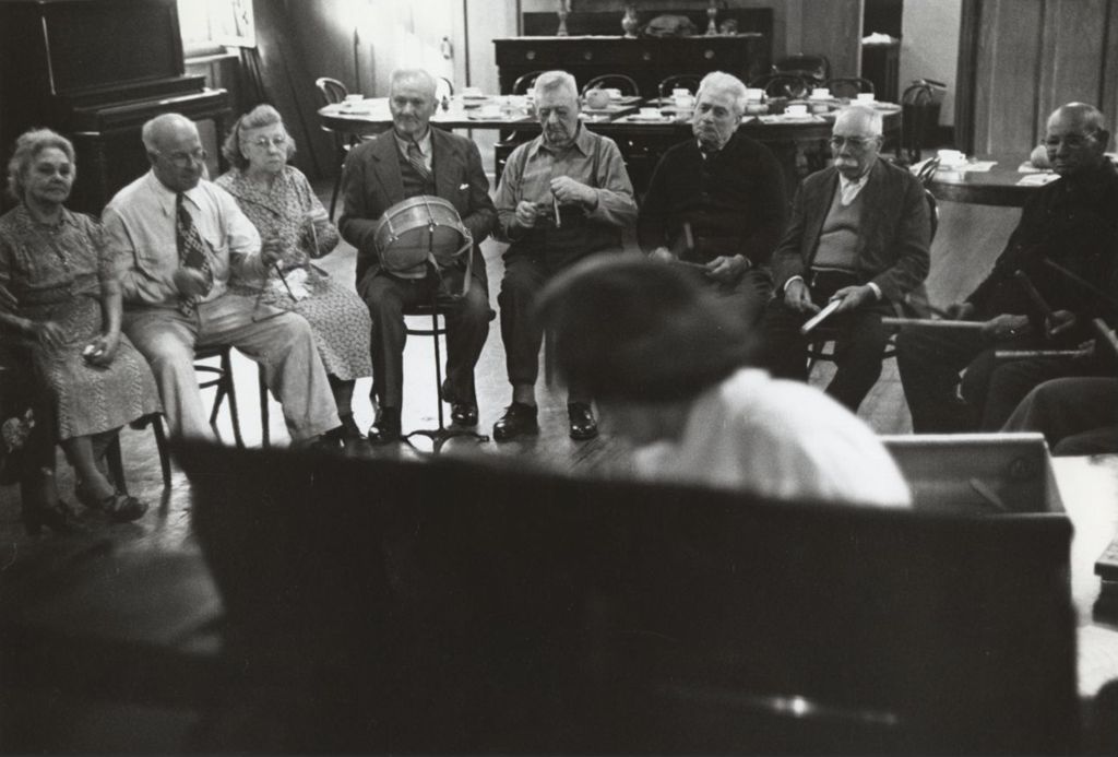 Members of the Hull-House senior citizens club playing instruments in a band in the Residents Dining Hall