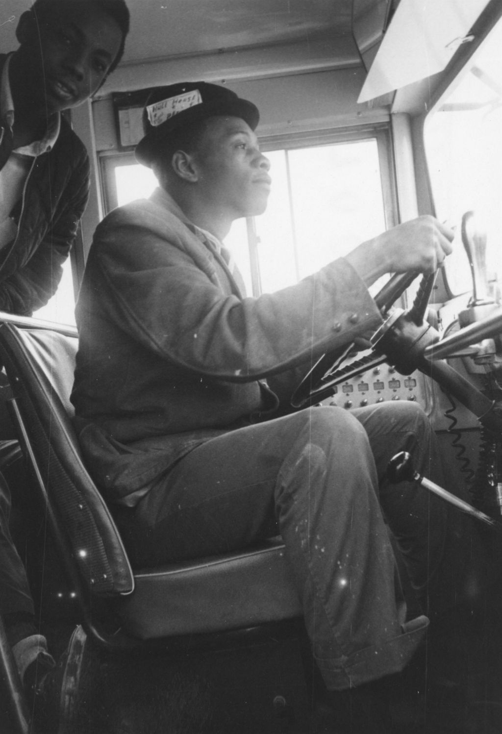 Two young men on a bus