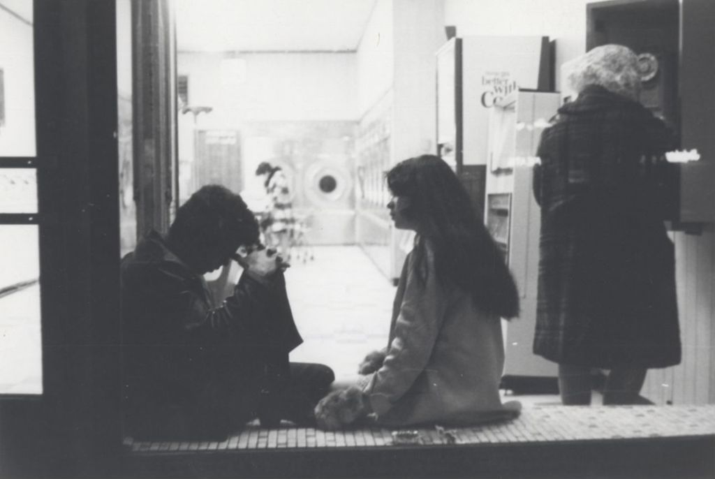 Young people at a laundromat