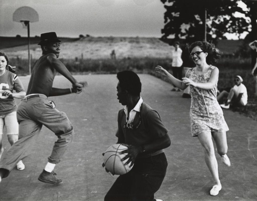 Young people playing basketball at the Hull-House work camp in Wisconsin