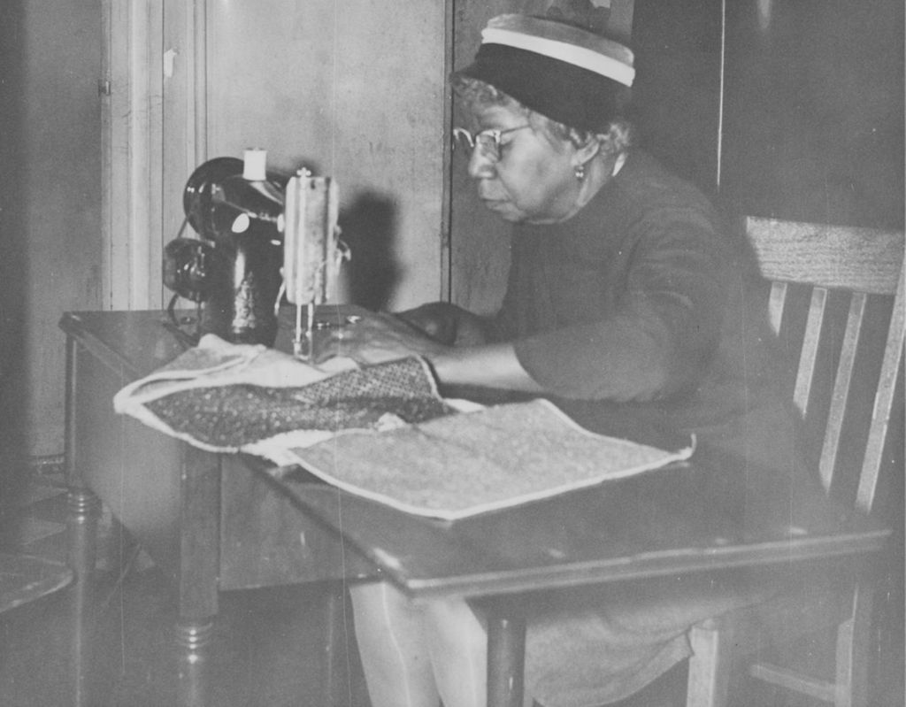Senior woman working at a sewing machine at Parkway Community House