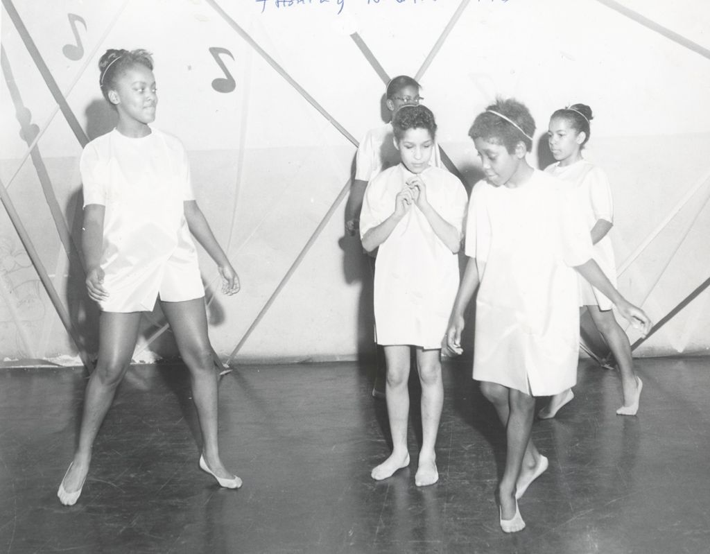 Miniature of Five girls perform a dance at a family night program at Parkway Community House