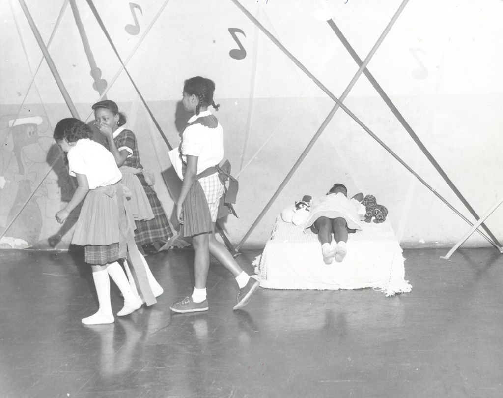 Four girls perform a skit at a family night program at Parkway Community House