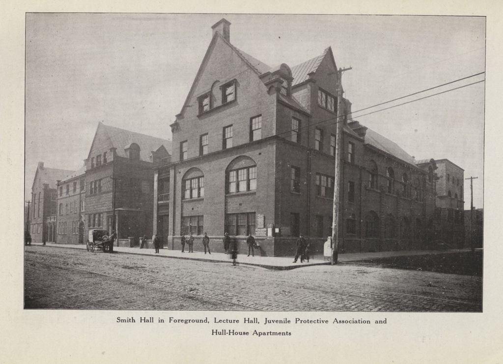Street scene showing exterior of Hull-House building complex looking south on Halsted Street
