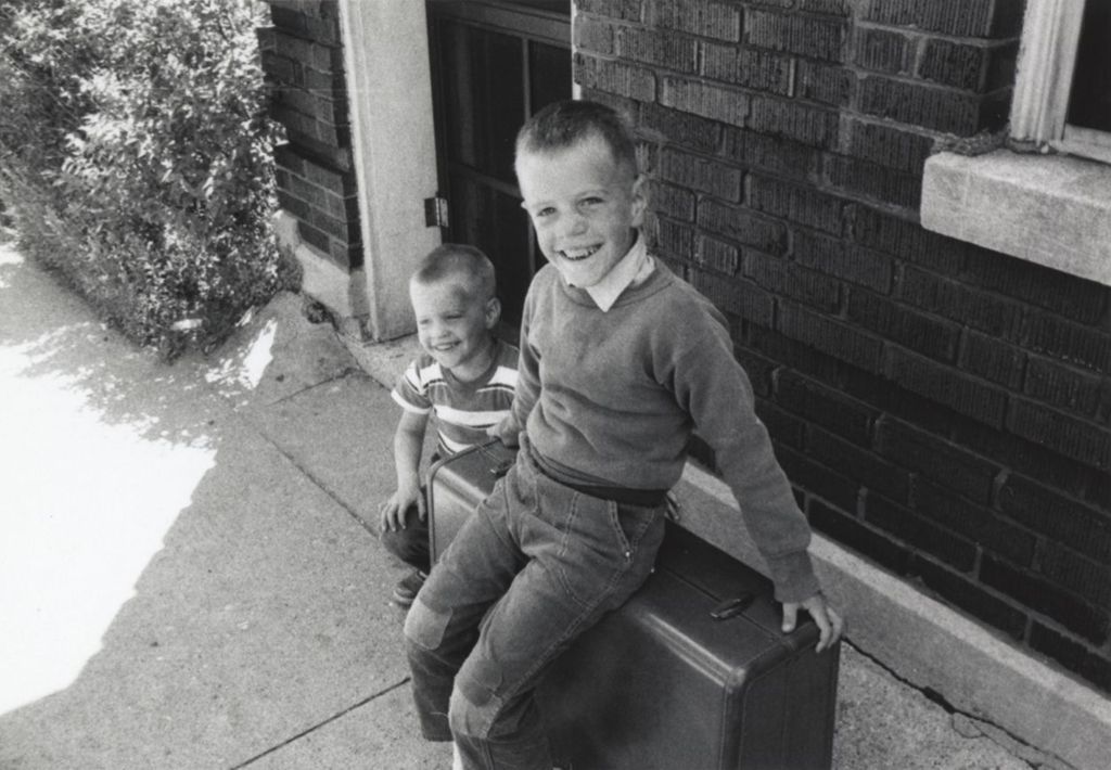 Miniature of Two boys outside a brick building