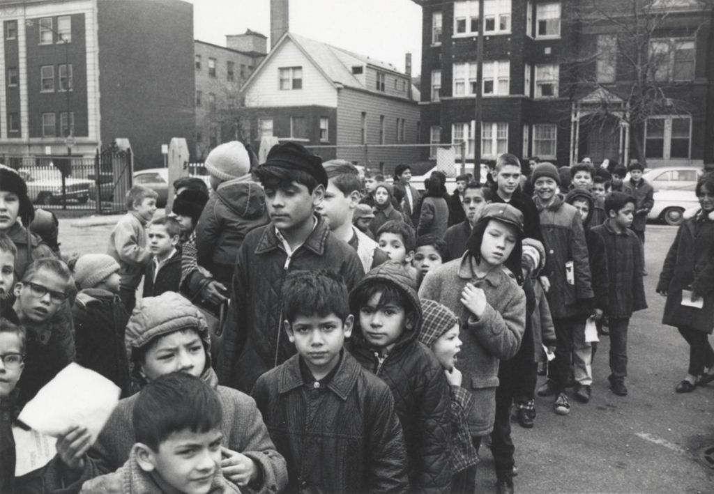 Miniature of Dozens of children in line for presents from Santa Claus at a Hull-House Christmas toy giveaway