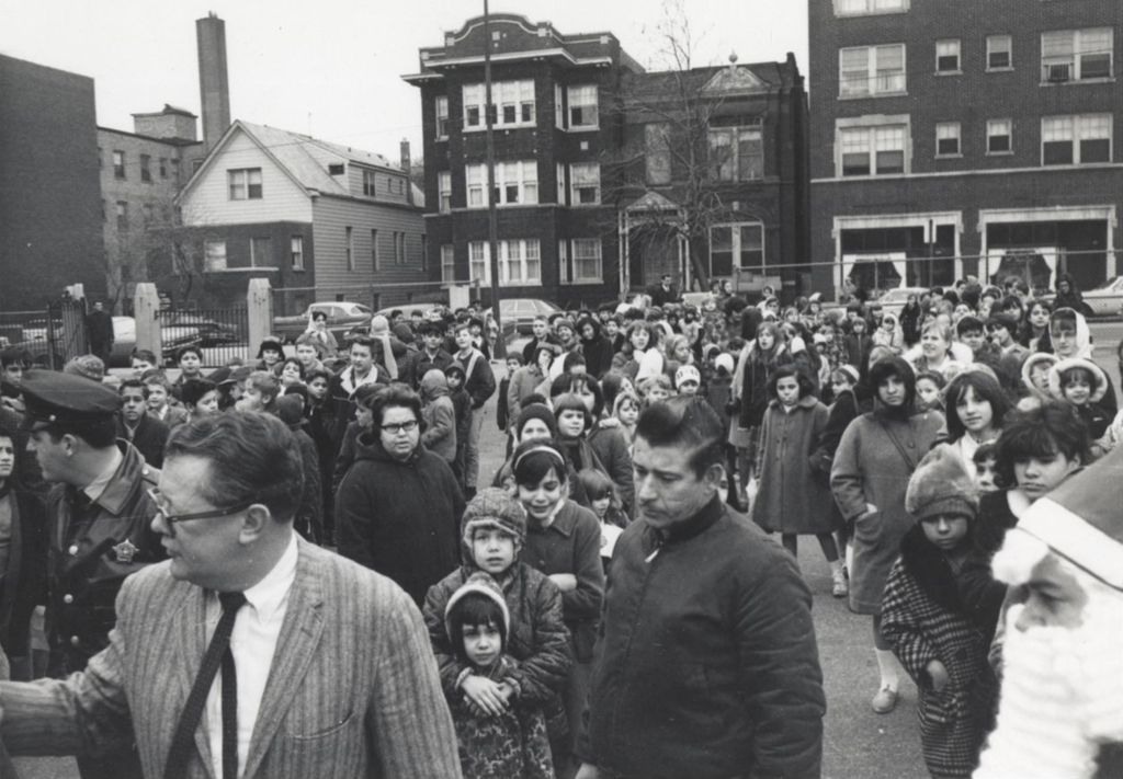Miniature of Large crowd of mostly children lining up for presents from Santa Claus at a Hull-House Christmas toy giveaway