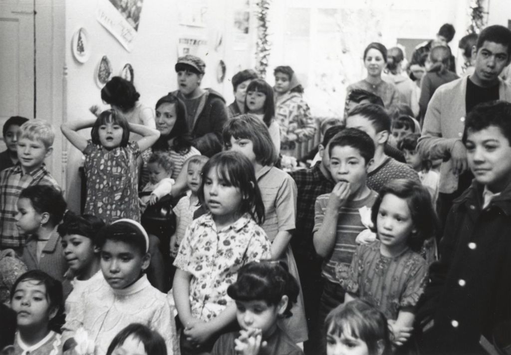 Children and adults at a Hull-House Christmas party at Jane Addams Center