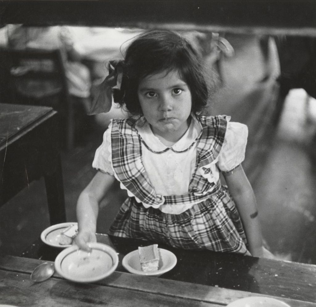 Young girl with small bowl