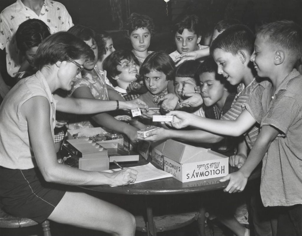 Miniature of Children buying candy from Miss McConnell