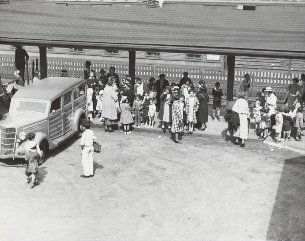 Miniature of Bowen Country Club station wagon meets campers at Waukegan Station