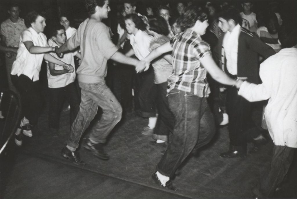 Teenage folk dancing