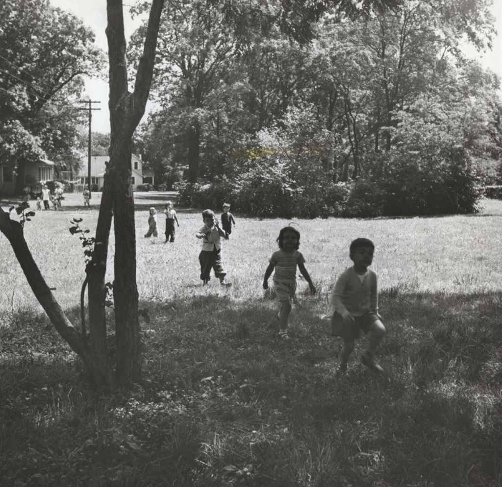 Miniature of Children walking across field at Bowen Country Club