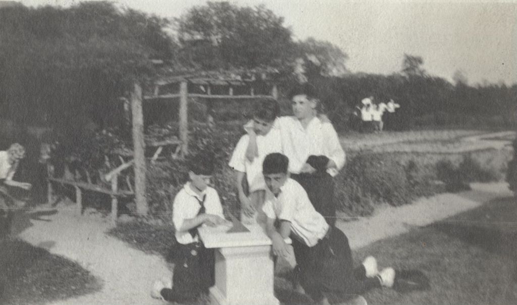 Miniature of Boys and sundial