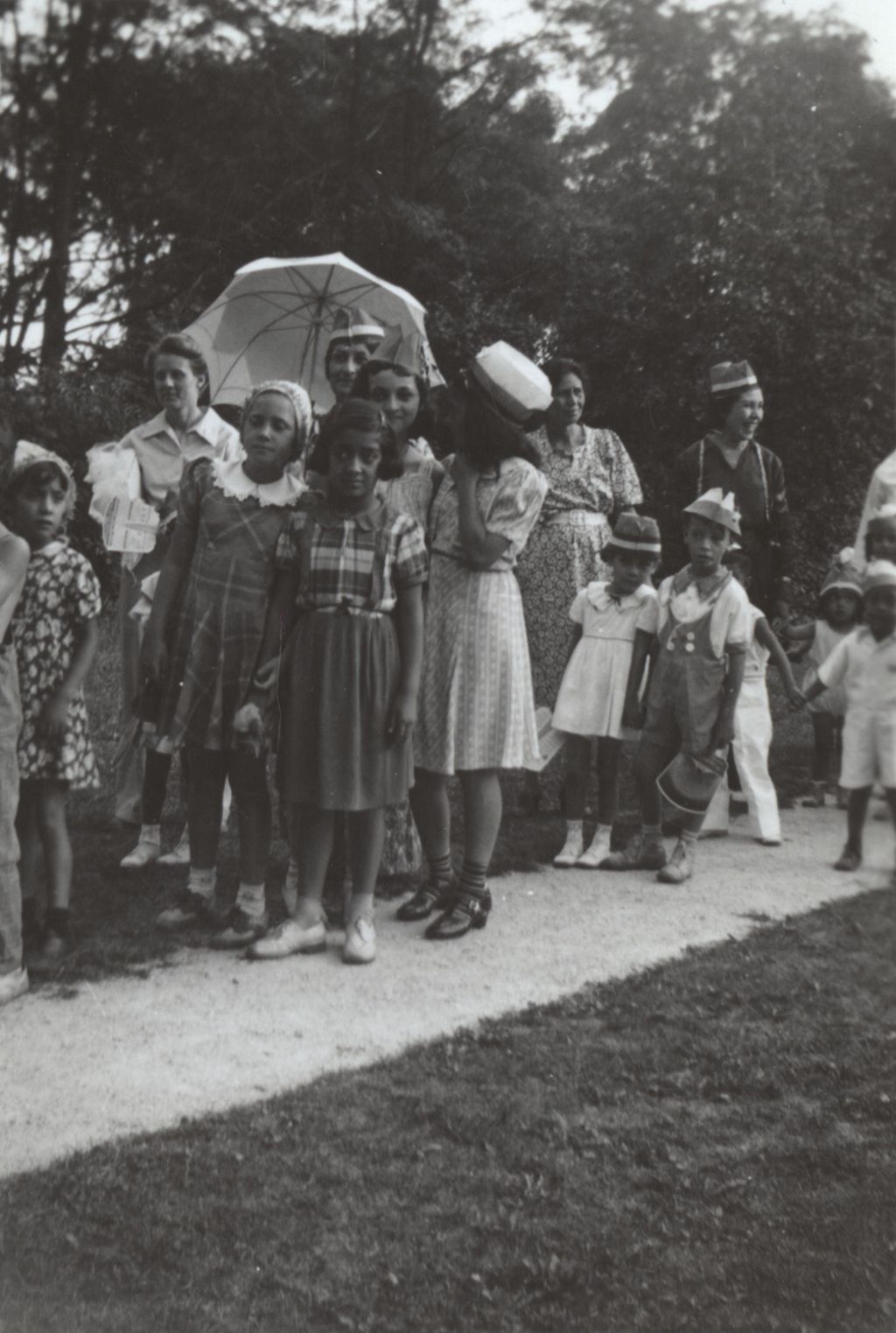 Miniature of Costumed children in line
