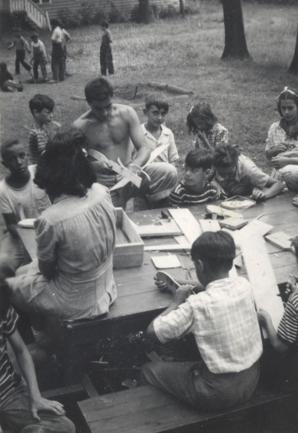 Miniature of Children woodworking at camp