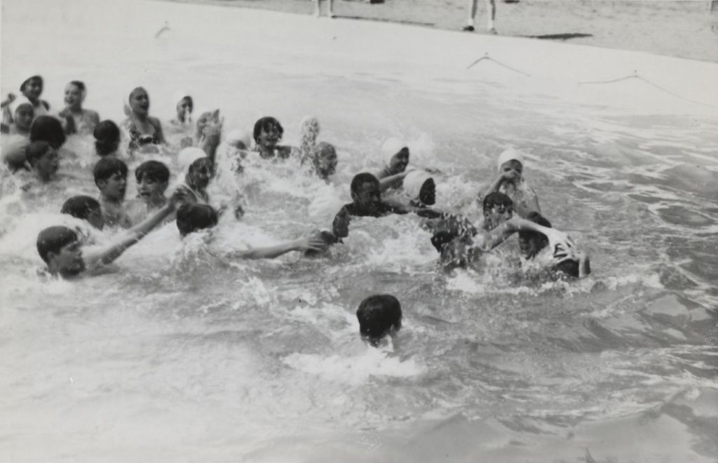 Miniature of Children swimming in old swimming pool
