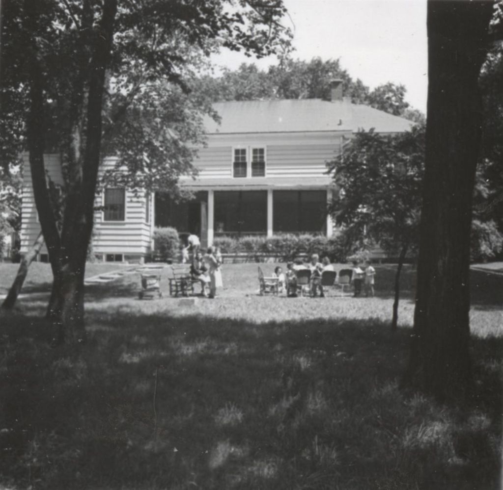 Miniature of Group of mothers and children in front of Rosenwald Cottage