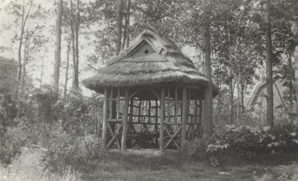 Miniature of Thatched gazebo in wooded area