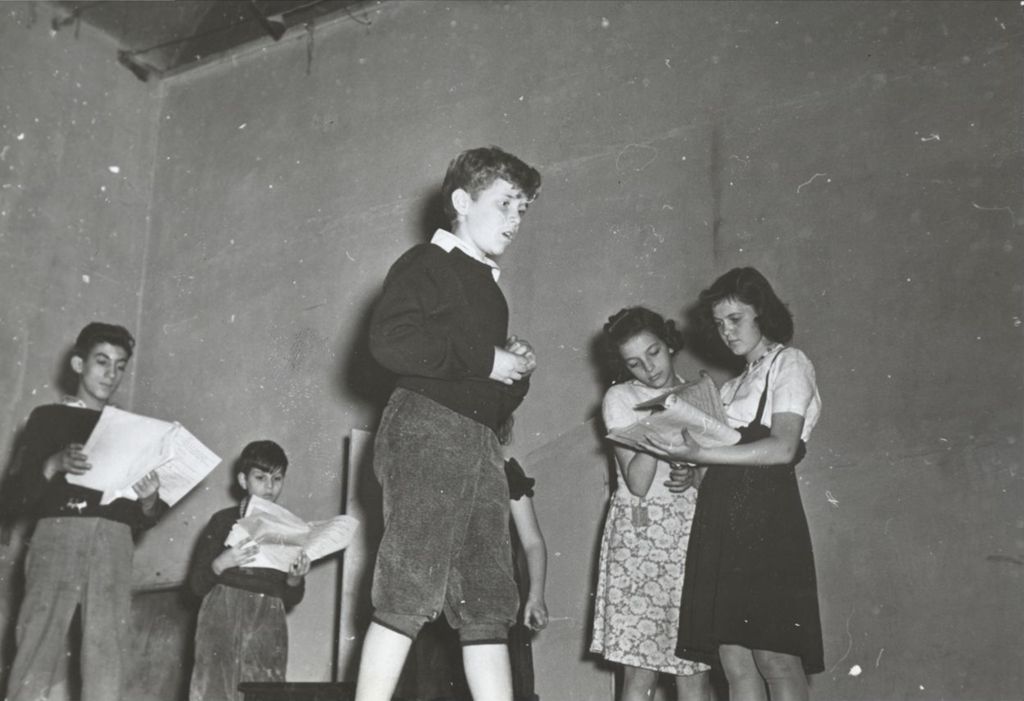 Members of the Hull-House Junior Theatre Group rehearsing "The Brave Little Tailor"