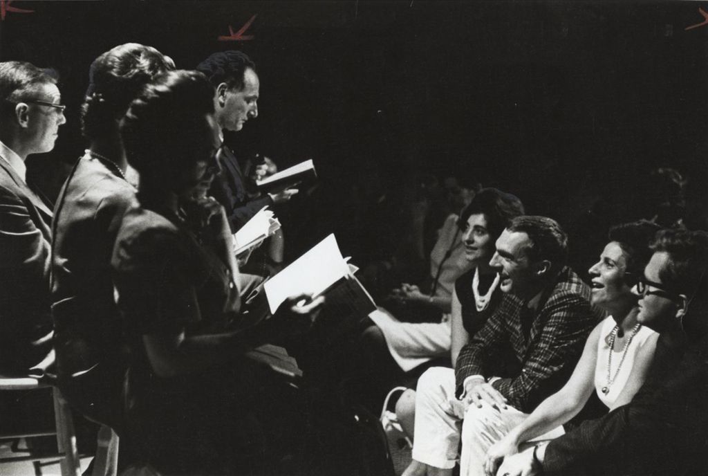 Actors with Hull-House Theatre conducting a reading in front of an audience