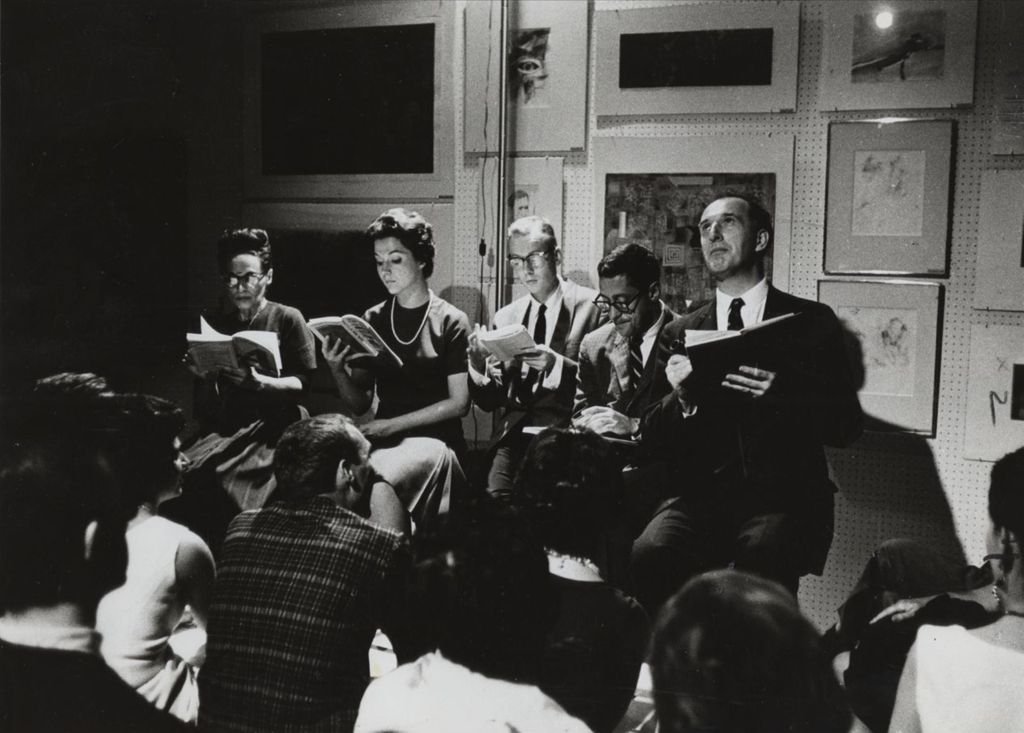 Five actors with Hull-House Theatre conducting a reading in front of an audience