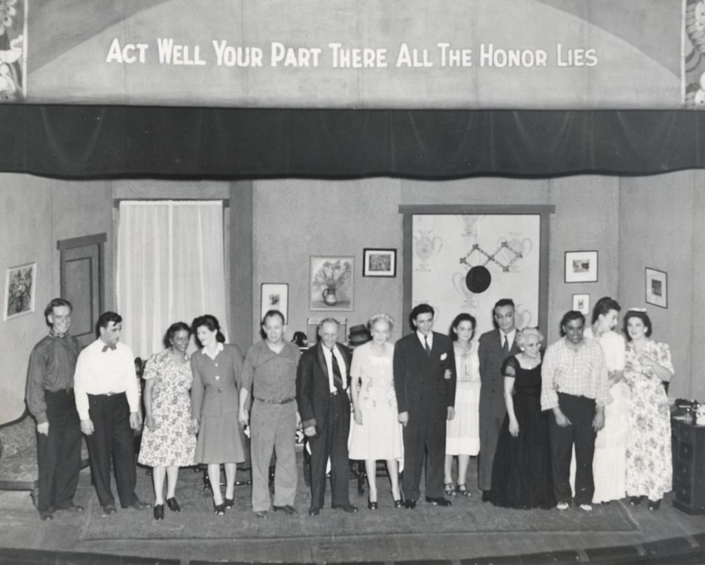 Miniature of Large group of actors on stage in a production at Hull-House