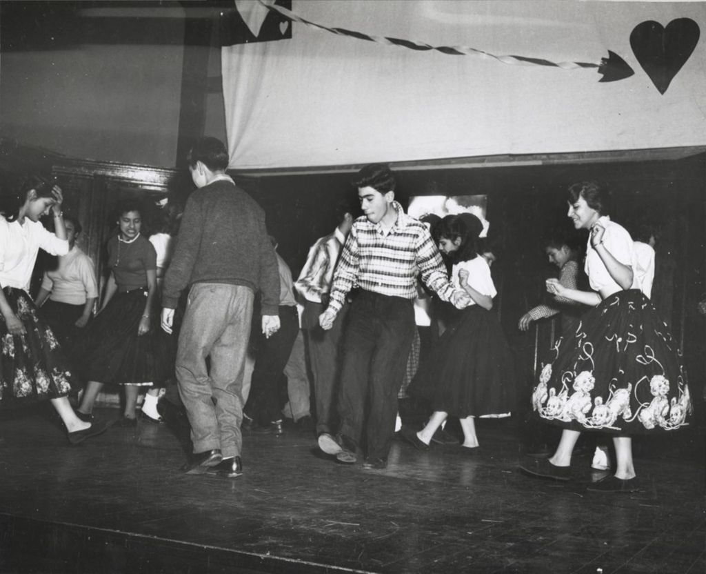 Teens dancing at a Hull-House social event