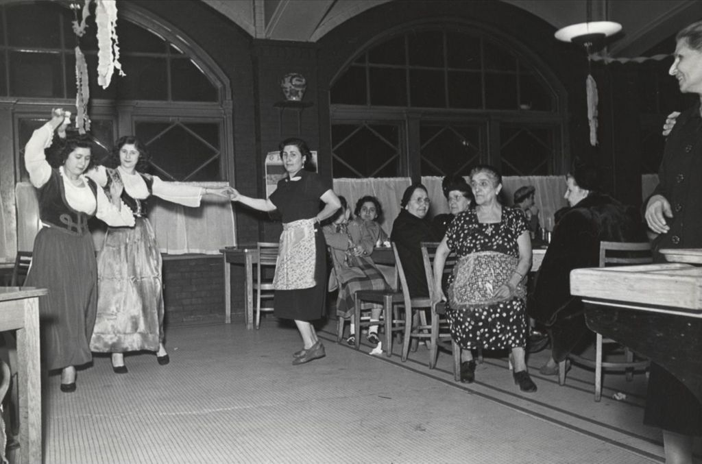 Miniature of Women in traditional Greek clothing dancing during Hull-House 1951 Spring Carnival