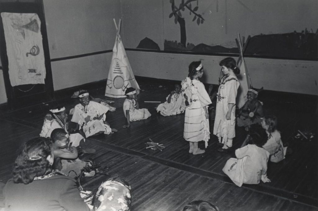 Miniature of Children dressed in Native American costumes in a theatrical production at Hull-House