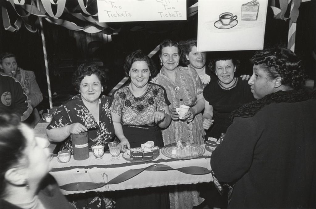 Women staffing a coffee and cake booth at Hull-House Carnival