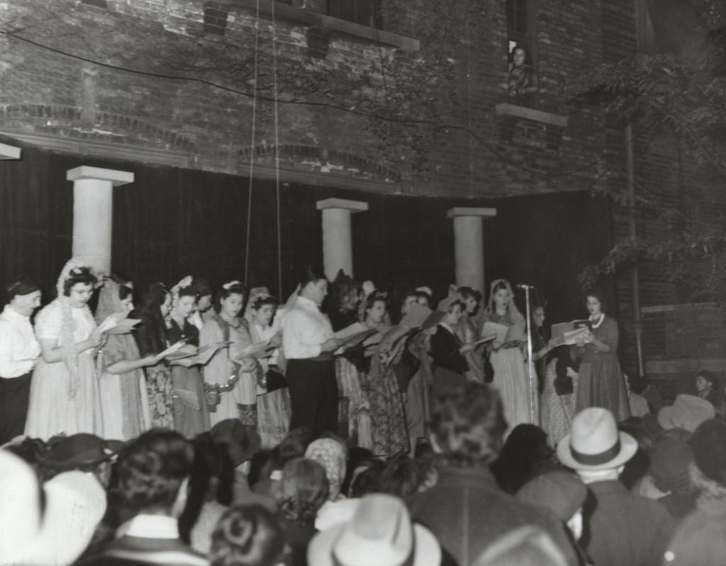 Singers on stage in the Hull-House courtyard during the 1940 Fall Festival