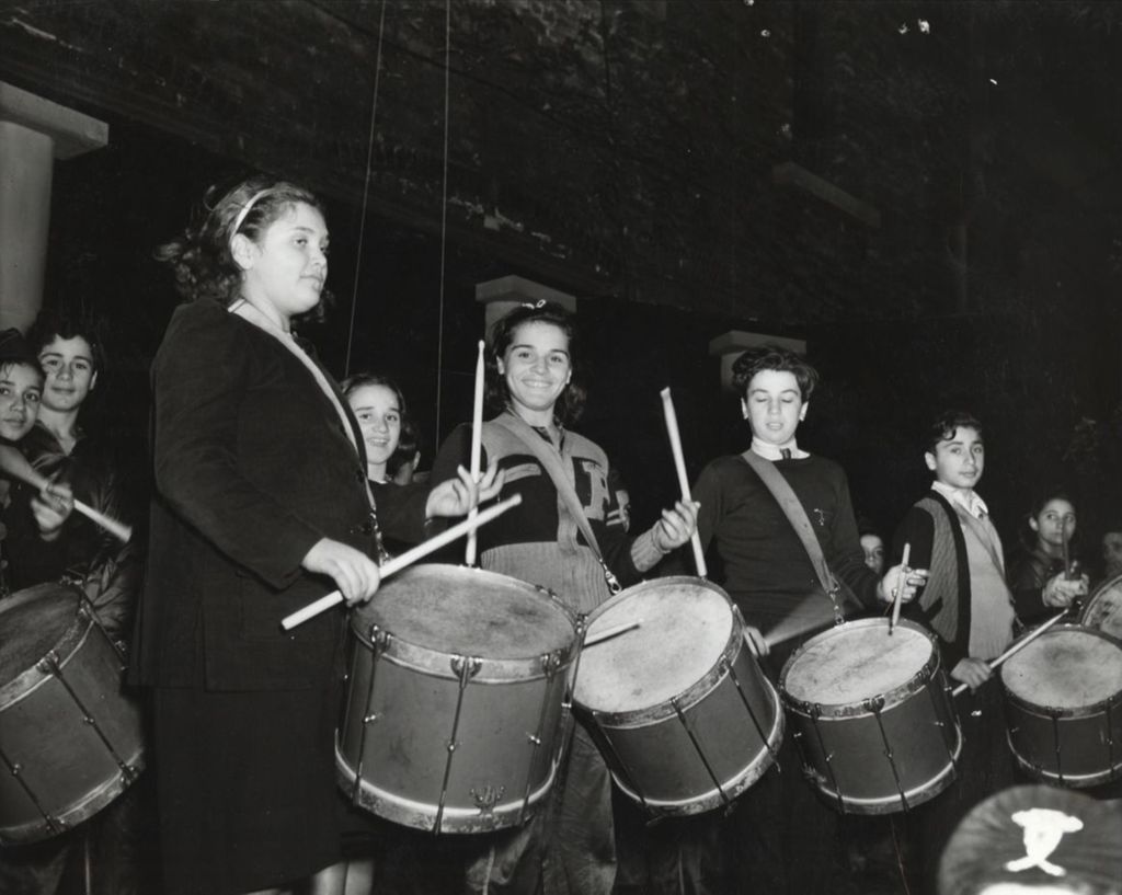Drum players on stage at the 1940 Hull-House Fall Festival
