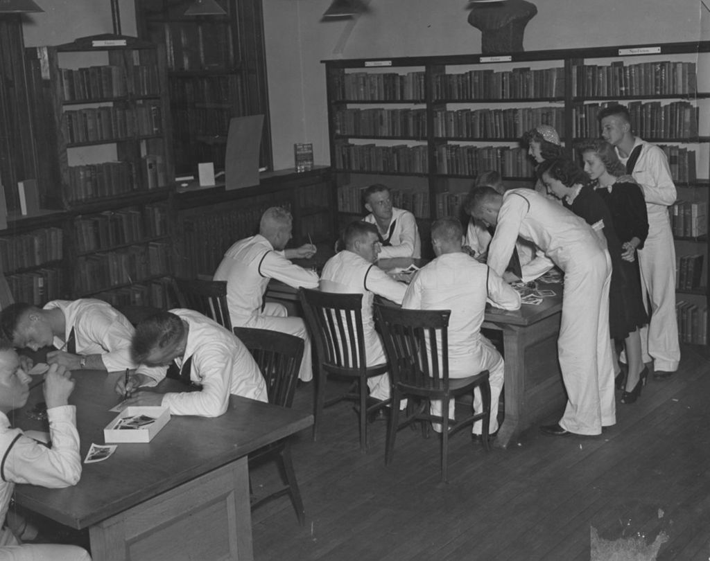 United States Navy sailors in a Hull-House library during an "Entertaining the Navy" event
