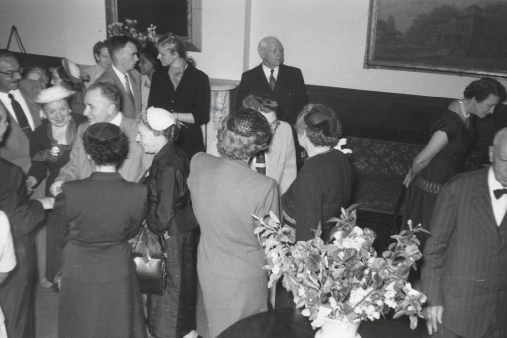 Attendees at a Hull-House reception at which Illinois governor Adlai Stevenson II appeared