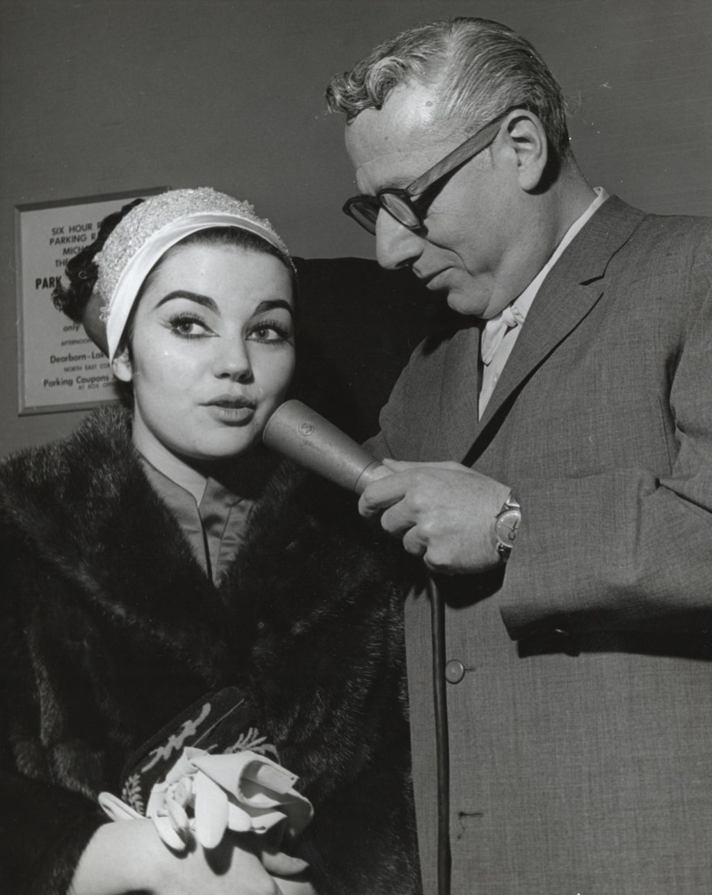 Radio host Jack Eigen interviewing actress Brigit Bazlen at the Chicago premiere of the film West Side Story at the Michael Todd Theatre. The premiere was a benefit for Hull-House