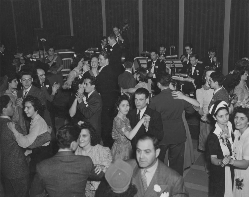 Couples dancing to a live band at the 1941 Lilac Ball at the Stevens Hotel