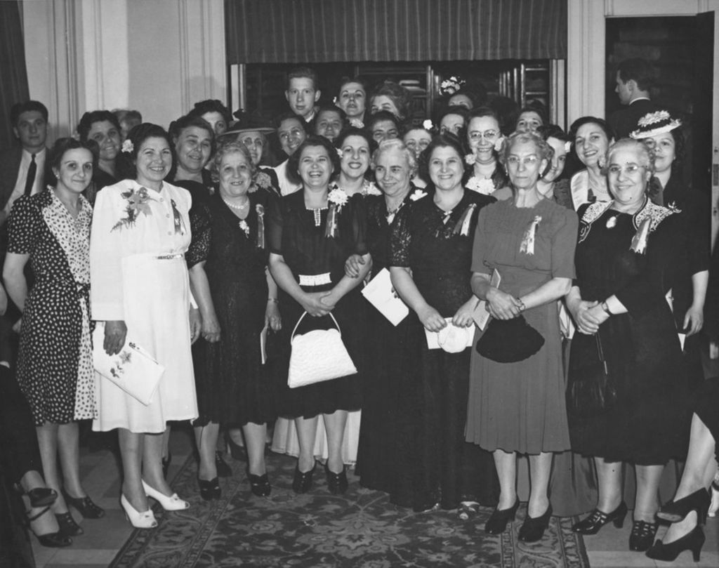 Approximately 26 women posing at the 1941 Lilac Ball at the Stevens Hotel