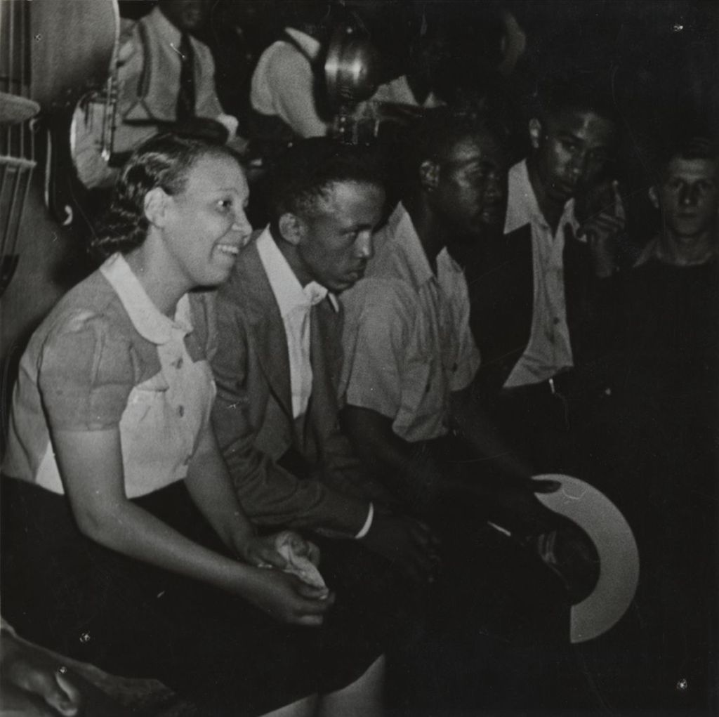 Attendees sitting at 1940 "Calico Ball"