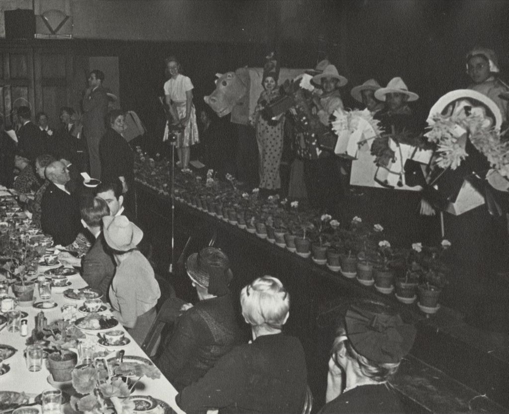 Costumed children on stage at the 1940 Hull-House Alumni Dinner, part of the 50th Anniversary celebration