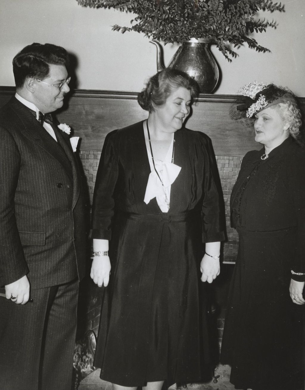 Miniature of Hull-House director Charlotte Carr with two others