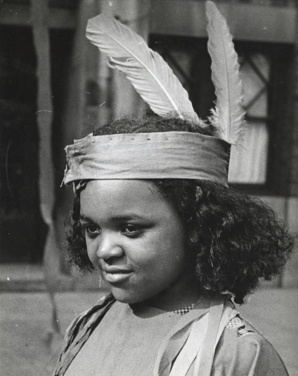 Miniature of Girl dressed in Native American costume for Hull-House 50th Anniversary circus in the Mary Crane Nursery courtyard