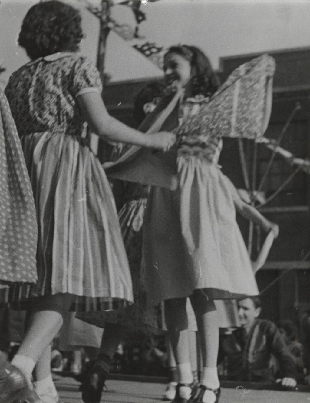 Girls on a stage performing a "Handkerchief Dance" as part of Hull-House 50th Anniversary circus show