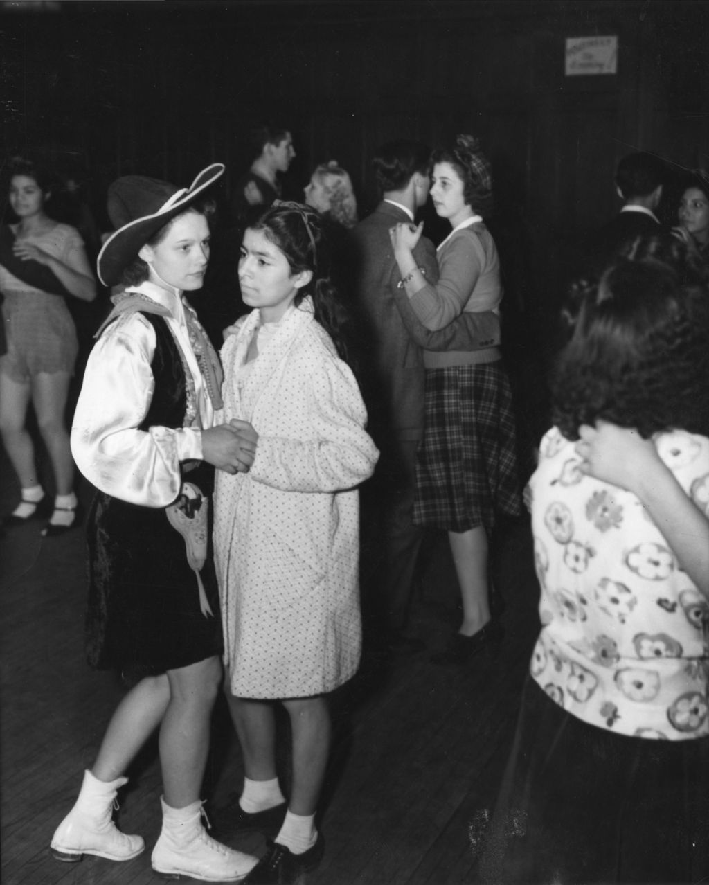 Pairs of young adults dancing at 1940 Hull-House Fall Festival teenage social