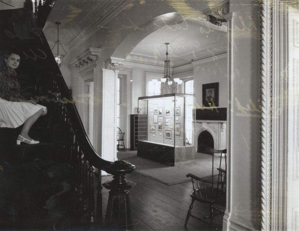 Miniature of Jane Addams Hull-House Museum curator Mary Lynn McCree on the stairway in the reception room