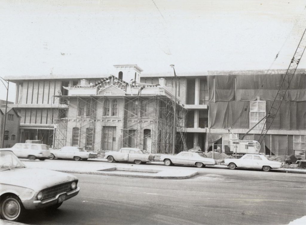 Hull Mansion during restoration with UICC Chicago Circle Center under construction behind it