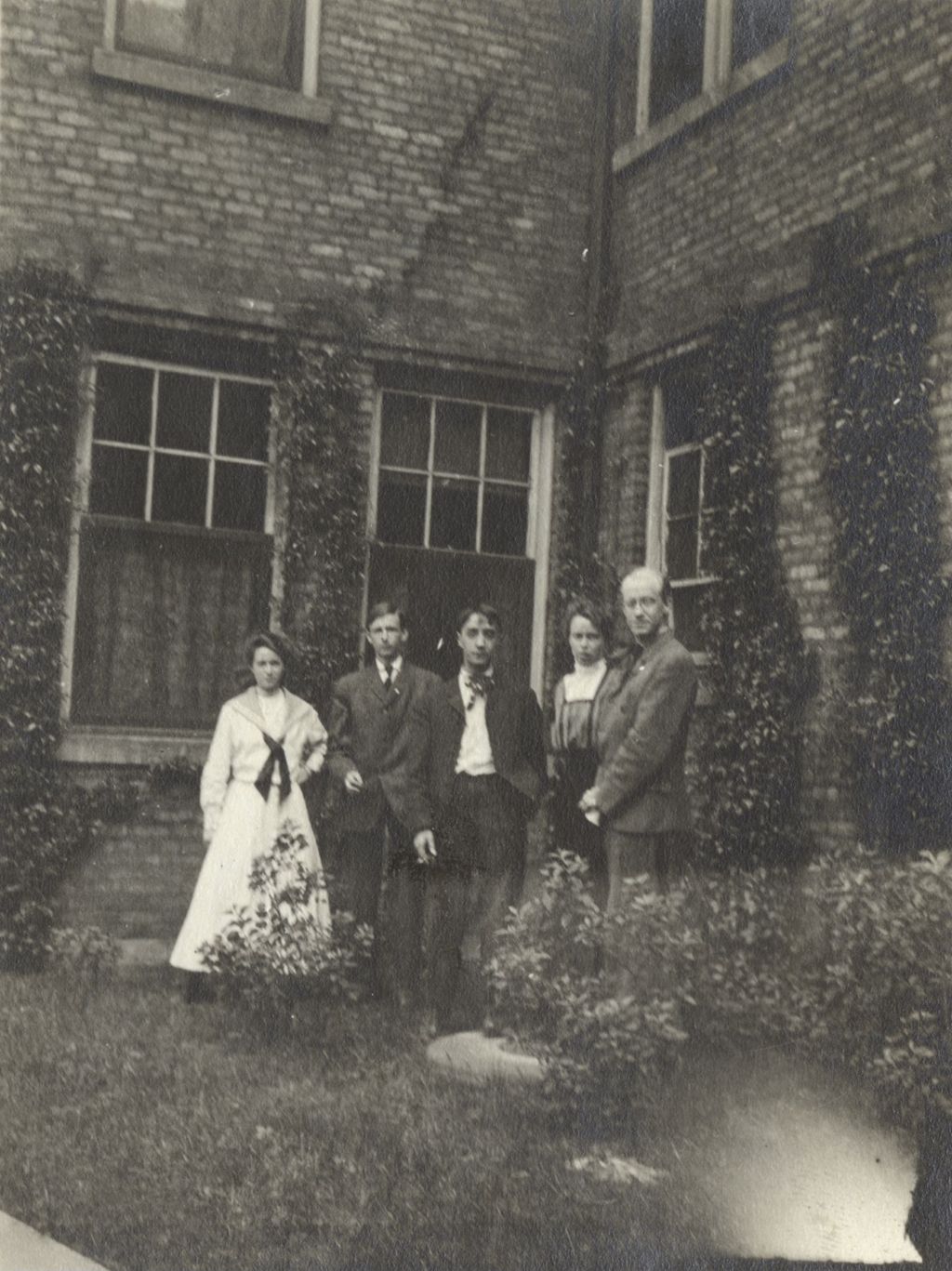 Miniature of Five Hull-House residents in the courtyard