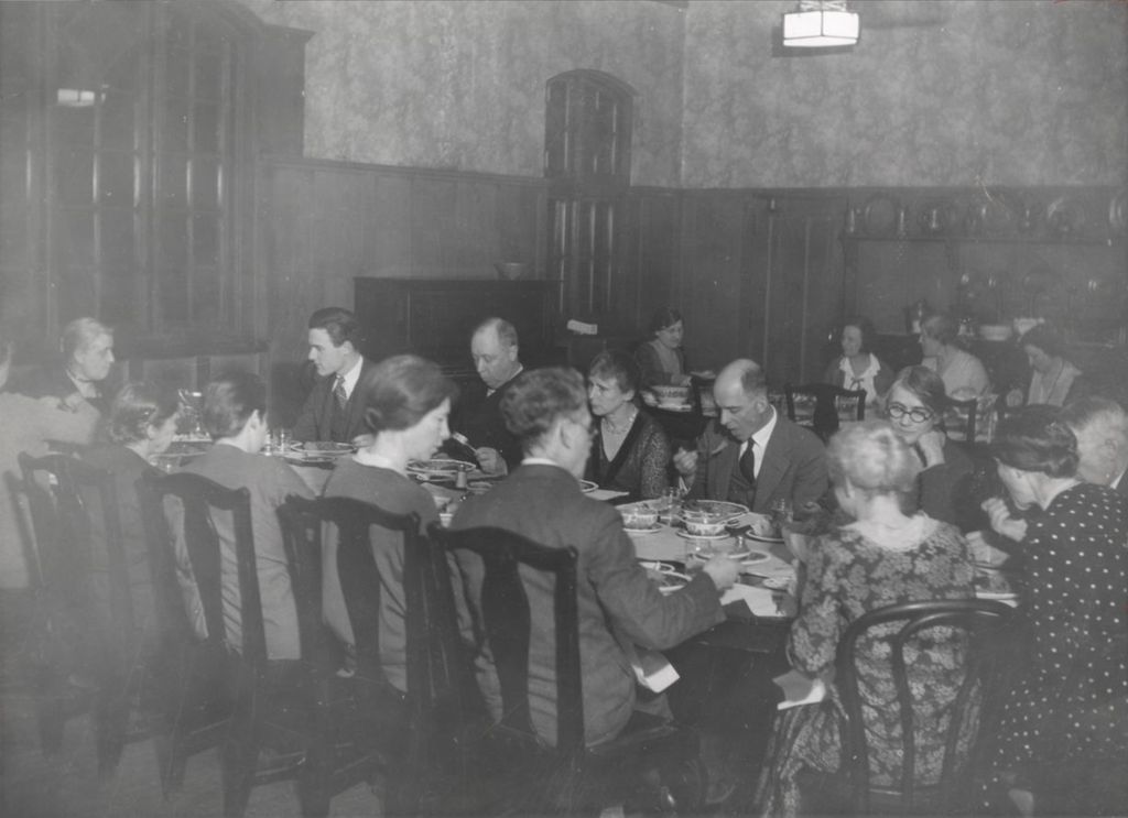 Miniature of Hull-House co-founder and head resident Jane Addams and other Hull-House residents dining in the Residents' Dining Hall